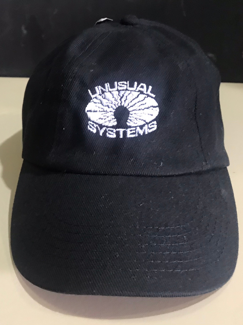 Unusual Systems - Black Cap